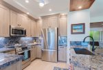 The kitchen is complete with top-of-the-line stainless steel Bosch appliances